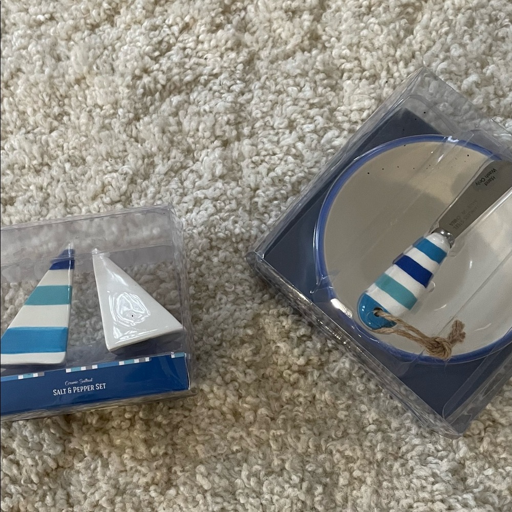 NWT. Dei   Salt and pepper sail boat shakers. They sit in a boat. Dip bowl/knife